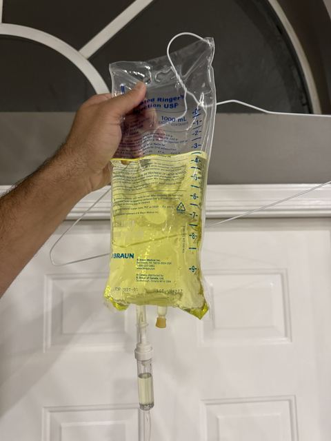 Hanging a vitamin IV bag